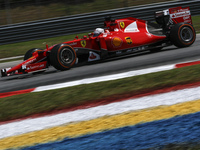 German Sebastian Vettel of Scuderia Ferrari in action during second practice session of Malaysian Formula One Grand Prix at Sepang Interatio...