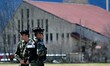 (150326) -- SEYNESEYNE, March 26, 2015 () -- Policemen patrol near a building which is to...