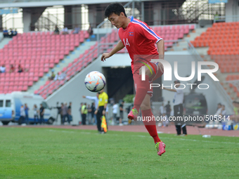 Yun IL Gwang of DPR Korea (R) in actions during the AFC U-23 Championship 2016 qualifiers round at Rajamangala Stadium in Bangkok, Thailand...