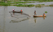 Bangladeshi fishermen fishing by traditional net in Ashulia near Dhaka, Bangladesh, on Nov...