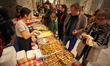 Fried foods are seen for sale during the Vegan Food Festival in Warsaw, Poland on October...