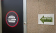 The banner of slow food vs Fast Food logo out side of the Slow Food Foundation for Biodive...