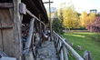 Visitors sit in a wooden cafe at Golden Village Open Air Museum in Ankara, Turkey on Novem...