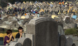 Malaysian ethnic Chinese pray at thei ancestors grave during the Qingming festival at a ce...