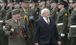 The Irish President Michael D. Higgins inspects the Guard of Honour during the solemn cere...