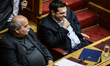 Minister of Interior Nikos Voutsis (L) and Prime Minister Alexis Tsipras (R) on April 6, 2...