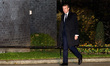 French President Emmanuel Macron arrives in Downing Street to attend a reception for NATO...