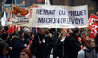 A banner reads 'Withdrawal of Macron-Delevoye's project'. Between 60 and 80000 protesters...