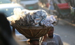 People buy fishes at a wholesale fish market in Dhaka, Bangladesh on December 6, 2019.  