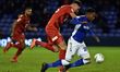 Jean Louis Akpa Akpro of Oldham Athletic and Dan Happe of Leyton Orient in action during t...