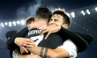 Cristiano Ronaldo of Juventus celebrates with Paulo Dybala after scoring the goal of 0-1 d...