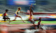 Winfred Mutile Yaviof Bahrain  Hyvin Kiyeng of Kenya  competing in the 3000 meter steeple...