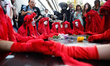 Members of Extension Rebellion protest outside British Fashion Council show space against...