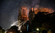 Smokes and flames rise during a fire at Notre-Dame Cathedral in central Paris, France, on...