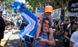 Peronist supporters dance during the welcome festival during the inauguration day of Presi...
