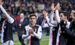 Paulo Dybala of Juventus celebrate after winning the UEFA Champions League Group D match b...