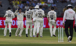 New Zealand celebrate the wicket of Steven Smith  during day one of the First Test match b...