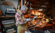 Former theatre actor and long time artist and luthier, Jozef Gmyrek (age 71), tunes a viol...