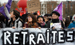 Women hold a banner reading 'Retirement'. Thousands of protesters demonstrated in Toulouse...