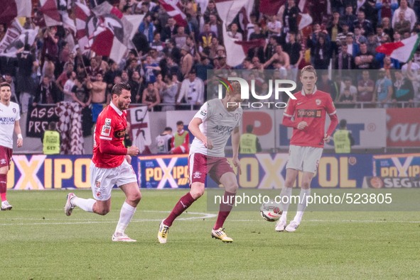 April 11, 2015: Marcel Gecov #15 of Rapid Bucharest  in action during the Liga I game between  FC Dinamo Bucharest ROU and FC Rapid Buchares...
