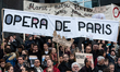 Singers, musicians, dancers and perosnnels of the Paris Opera on strike strike a pose unde...