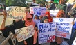  Women hold placards during the ' Shanti March' as they protest against Citizenship Amendm...