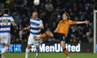  Toni Leistner of Queens Park Rangers heading the ball with Tom Eaves of Hull City putting...