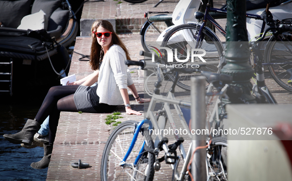 On April 15, 2015 was the warmest day of Spring in The Netherlands this year. In the student city of Leiden people can be seen going out in...