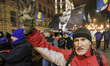 Ukrainians attend a torchlight procession dedicated to the 111th of Stepan Bandera birthda...