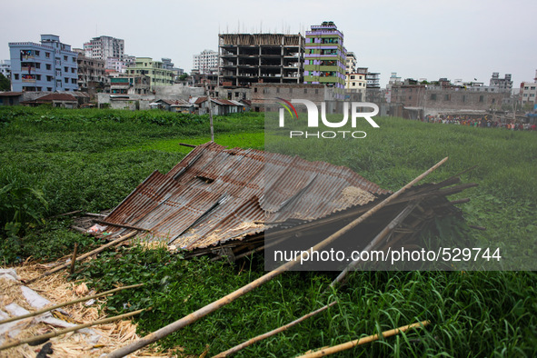 A remaining tin shed over the Hajipara Jheel, Dhaka, Bangladesh, 16 April 2015 after the collapse of two storied tin-shed house on swampy gr...