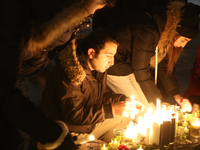 Iranian-Canadians light candles during a candlelight vigil at Mel Lastman Square in Toronto, Ontario, Canada, on January 09, 2020 for the vi...