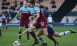  Josie Green of Tottenham Hotspur Women and Julia Simic of West Ham United Women going for...