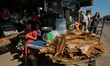 A street stand-shop with a drying fish near Kdat bridge in Changhaon, CambodiaOn Sunday,...