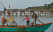 A couple of fishermen arrive from fishing in Kep city.On Tuesday, January 7, 2020, Kep Ci...