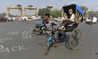 A rickshaw puller ferries a tourist in Kolkata, India, 18 January, 2020.  