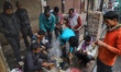 People drink Tea on a cold morning in Old Delhi, India on 21 January 2020 