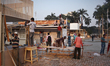 Workers prepare shops for upcoming Ekushey Book fair at  Suhrawardy Uddayan in Dhaka, Bang...