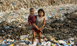 Indian kids at a dumping site on the eve of World Earth Day in Guwahati in the Northeaster...