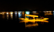 Srinagar, Indian Administered Kashmir, India - APRIL 22, 2015 - A Kashmiri boatman is silh...