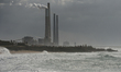 A dark sky and dramatic waves near Orot Rabin Power Plant in Hadera. Israel's Mediterrane...