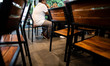 Mr. TAUFIK (whit shirt), Mrs. ILYAAS (yellow hijab) and DIZA (purple hijab) were eating at...