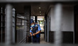 A guard from VIP airport guest prepare to open the VIP gate. Total of 238 of Indonesian Ci...