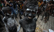 Artists perform during the procession of Maha Shivaratri festival , celebrated in the reve...