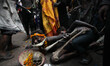 Artists dressed as various characters, perform human skull and bones during the procession...