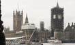 A view of Big Ben covered in scaffolding, the massive bell which normally chimes from West...