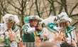 The members of Rose Monday Parade throw candy to the crowd during the Rose Monday Parade o...