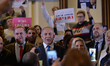 Israeli Prime Minister Benjamin Netanyahu, accompanied by his wife Sarah, meets his suppor...