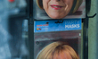 Party masks with images of Theresa May, a former UK Prime Minister and Angela Merkel, the...