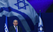 Israeli Prime Minister Benjamin Netanyahu speaks to supporters following the announcement...