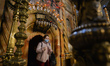 A woman wearing a protective mask seen inside the Church of the Holy Sepulchre in Jerusale...